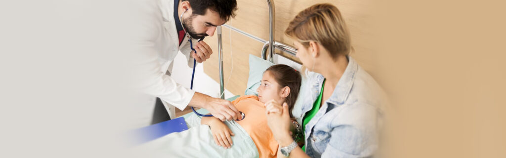 Doctors examining child patient, Express ER pediatric emergency care